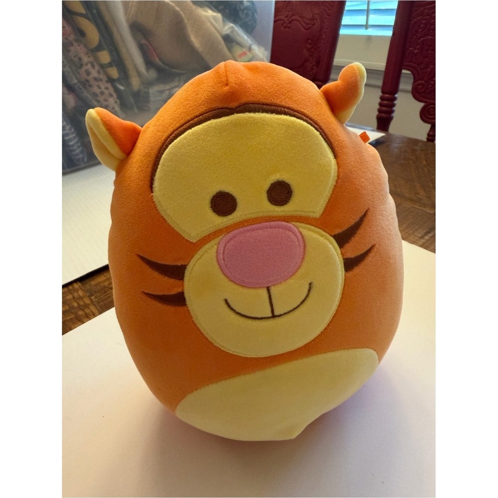 Bounce into comfort with this adorable, authentic Disney Tigger Squishmallow!
